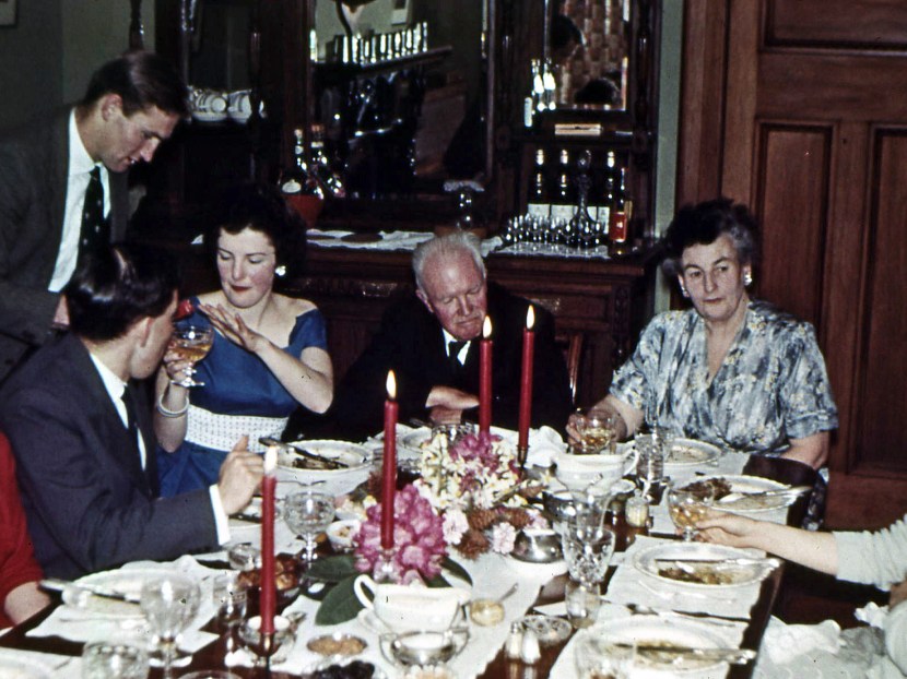 Edwardian splendor in native timbers. Dinner party at Toad Hall. [Left-right] John Allan [standing], George Salmond, guest, Mr & Mrs Laing (neighbours). Jim Scott Collection.